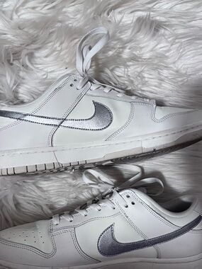 Nike White Sneakers with Silver Swoosh